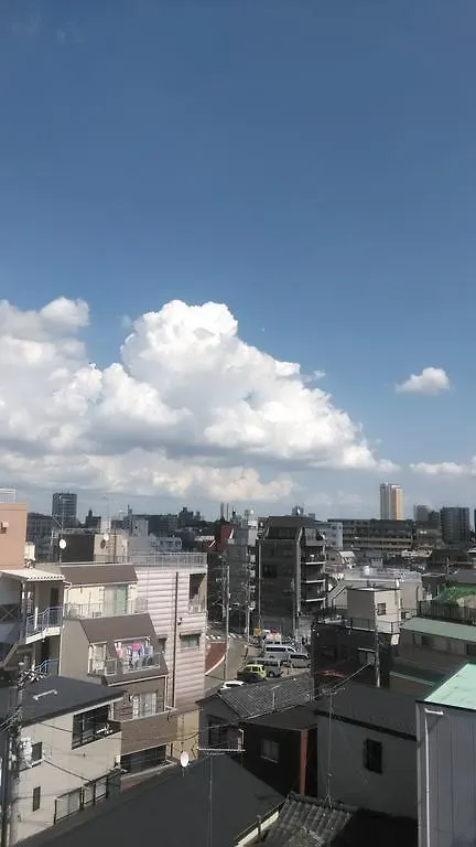 Base Inn Komagome Токио Япония